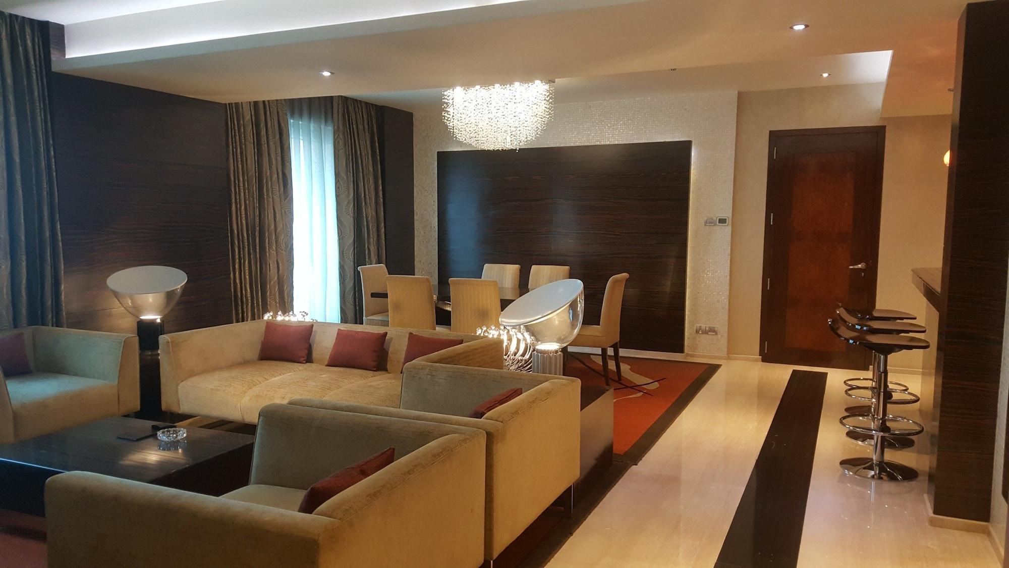 Vivanta Hyderabad, Begumpet Extérieur photo A living room in a suite at the Ritz-Carlton, DIFC